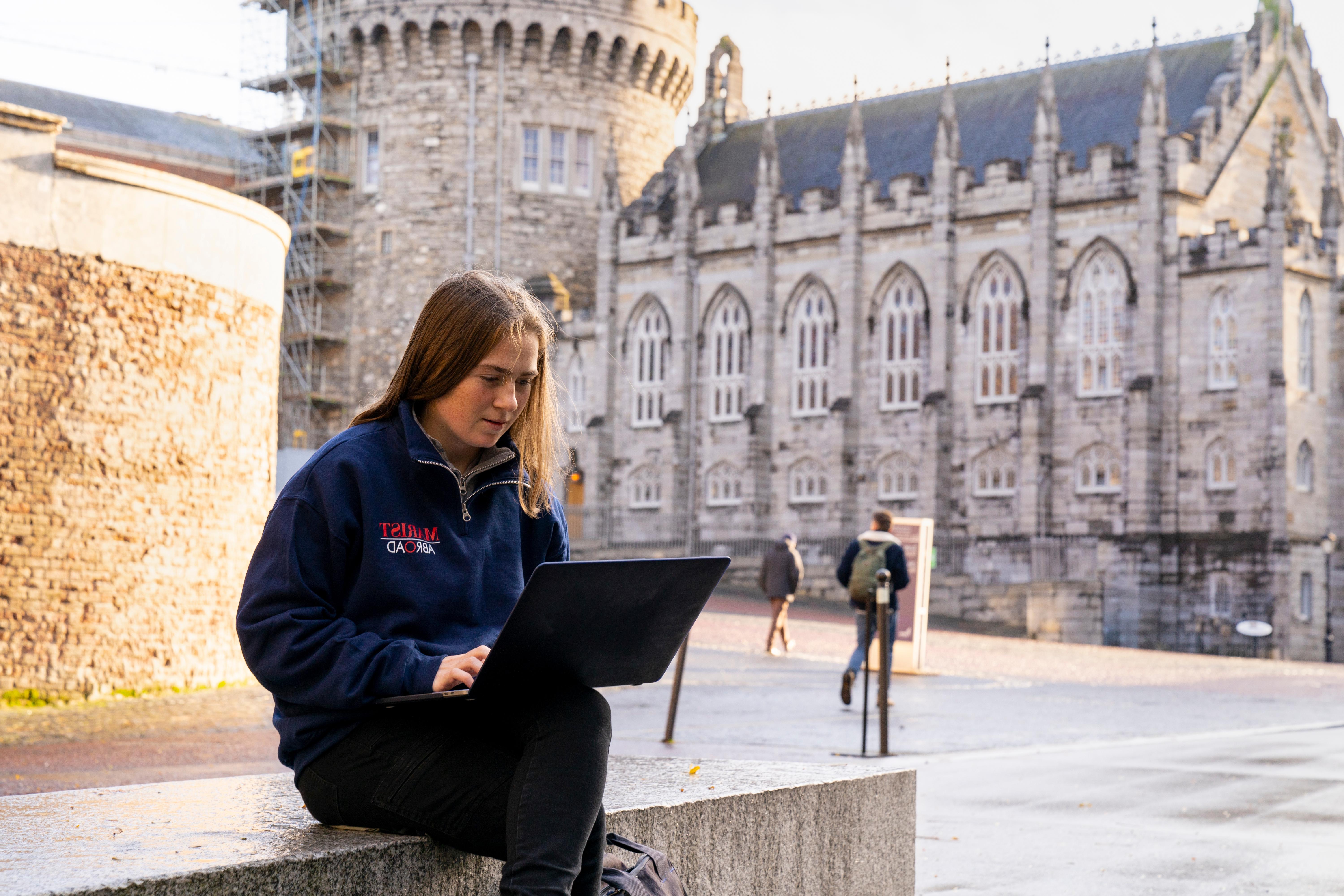 Marist student studying on a laptop in Dublin, Ireland